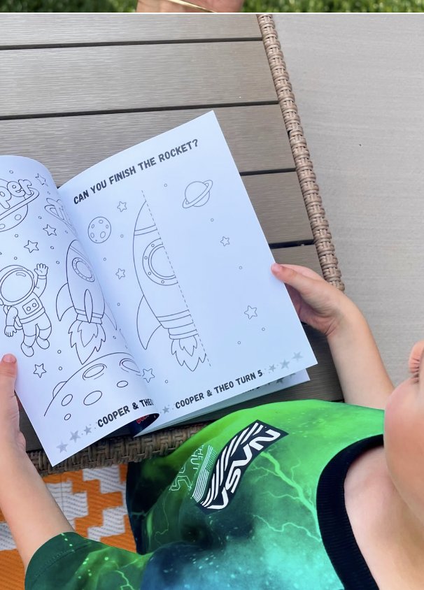 Child colouring their book